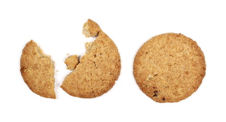 Round whole wheat biscuits with raisins isolated on white background, top view