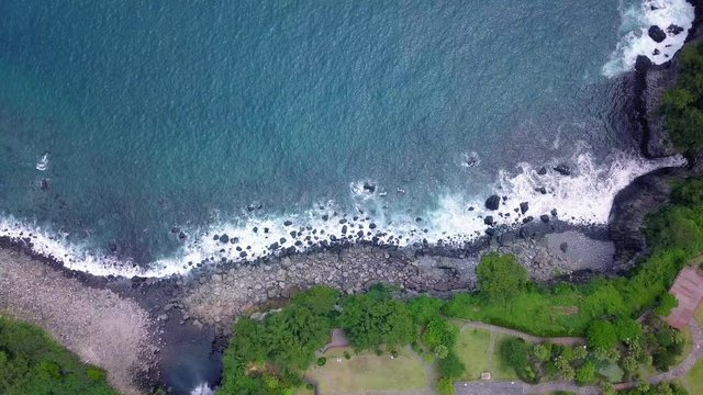 Aerial View of Volcanic Sea Shore with Waves