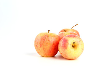 Red apples on a white background