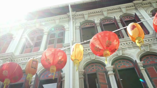 Red lanterns hang at the street in Chinatown district in Singapore, Singapore