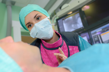 Surgeon talking to patient