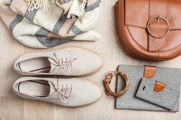 women's flat lay clothes shoes, scarf, bracelet, bag, tablet, smartlphone. Fashion blog, clothing, shopping