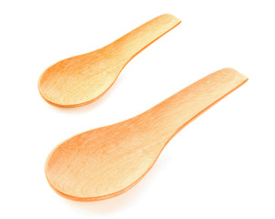 Wooden spoons on white background