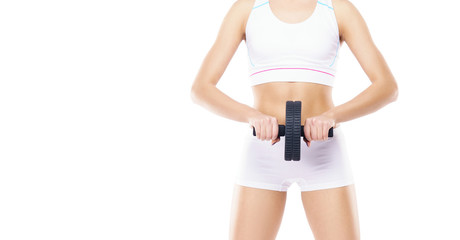 Young and sporty woman isolated on white background