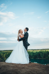 Wedding of a beautiful couple against the backdrop of a canyon a