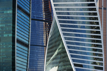 Fototapeta na wymiar Office buildings, business skyscrapers in financial centre of city, modern glass architecture in commercial downtown, future design abstraction 