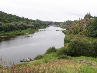 Summer landscape with trees and river