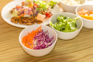 Fresh vegetable salad with worm insects