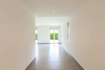 Empty room with window and totally white walls