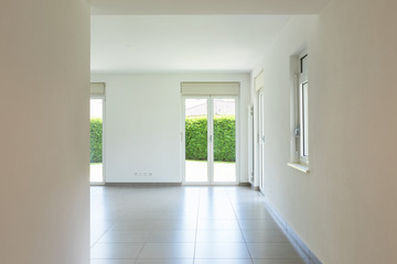 Empty room with window and totally white walls