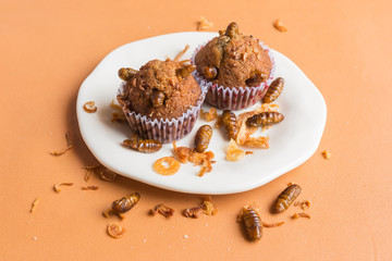 Banana cupcakes with insect