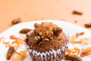 Banana cupcakes with insect