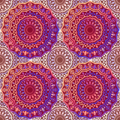Seamless pattern with a circular ornament. Bright background with styled ethnic motives. Mandala wallpaper.