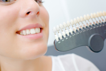 Lady holding teeth samples