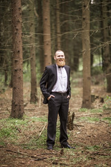 Fototapeta na wymiar portrait of a successful businessman in a forest