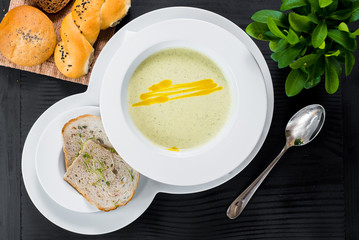 Tasty lemtils cream soup on wooden background. Top view