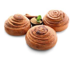 Sweet cinnamon buns on white background