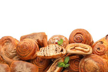 Sweet cinnamon buns on white background
