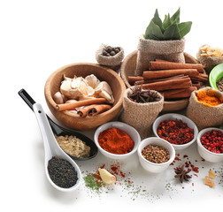 Composition with different spices on white background