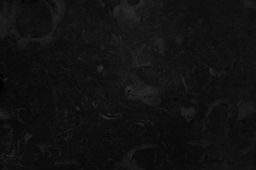 Black marble texture with light veins and spots. Perfect natural pattern for background or tile     