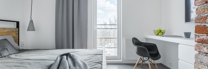 Bedroom with white desk