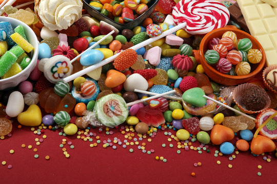 candies with jelly and sugar. colorful array of different childs sweets and treats