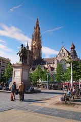 Obraz premium Antwerp, Belgium-MAY 02, 2018: Statue Pieter Paul Rubens on Green square (Dutch: Groenplaats) and amazing Cathedral of Our Lady at the background