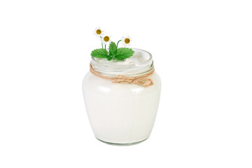 Open sour cream can with chamomile