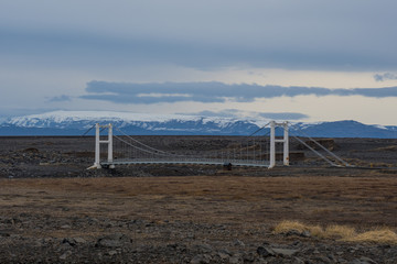 Bridge crossing river in Northeast Iceland