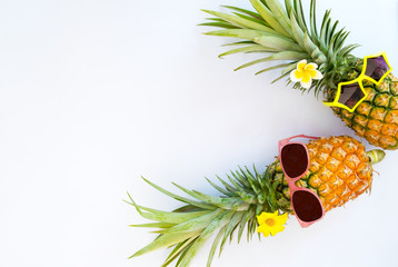 Hipster pineapples fashion. Summer vacation background concept. Creative flat lay, top view design