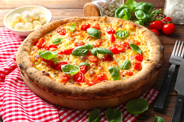 Delicious pizza on table