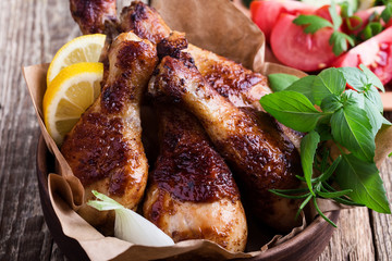 Chicken drumsticks and fresh vegetables, favorite meal