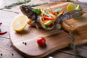 Stuffed and grilled dorado fish