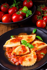 rustic Delicious Pasta - Ravioli in tomato sauce with basil