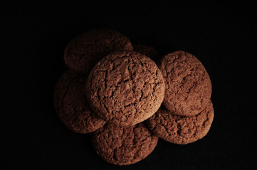 oatmeal cookies on a black table