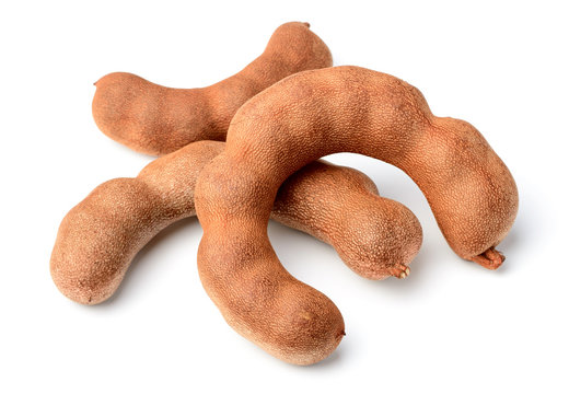 fresh tamarind fruit isolated on white
