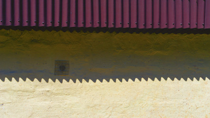 Shadow from the roof on the wall