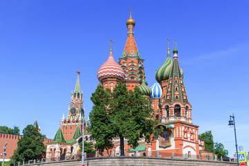 Fototapeta na wymiar St. Basil's Cathedral on Red square against Moscow Kremlin on a sunny summer morning