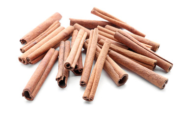 Aromatic cinnamon sticks on white background