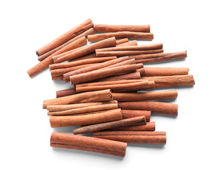 Aromatic cinnamon sticks on white background