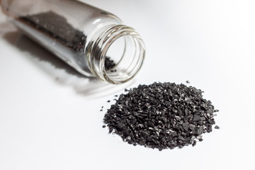 activated carbon or granular in clear bottle is used in air purification, decaffeinate, gold...