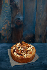 Walnut pie on a black background