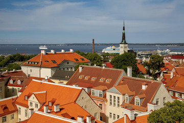 Fototapeta na wymiar TALLINN, ESTONIA - View from the Bell tower of Dome Church / St. Mary's Cathedral, Toompea hill at The Old Town, Baltic Sea and cruise ferries