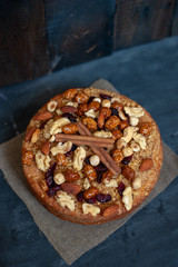 Walnut pie on a black background