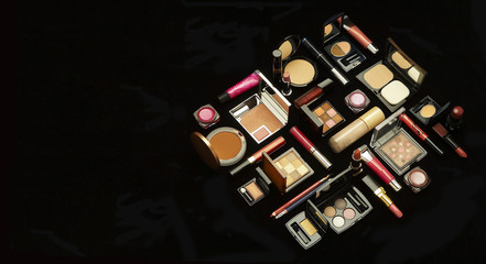 Set of decorative cosmetics on a Black Background