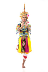 Asian woman in traditional costume of Southern Thailand. Nora dance show.Two hands on the front of the chest. Right leg lifts back.