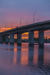 Fototapeta na wymiar The bridge over the River at sunset