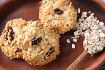 Plate with delicious oatmeal cookies, closeup