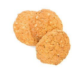 Delicious oatmeal cookies on white background