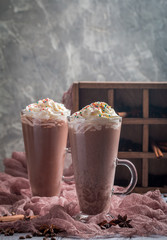 Chocolate milkshake in tall glass mugs 